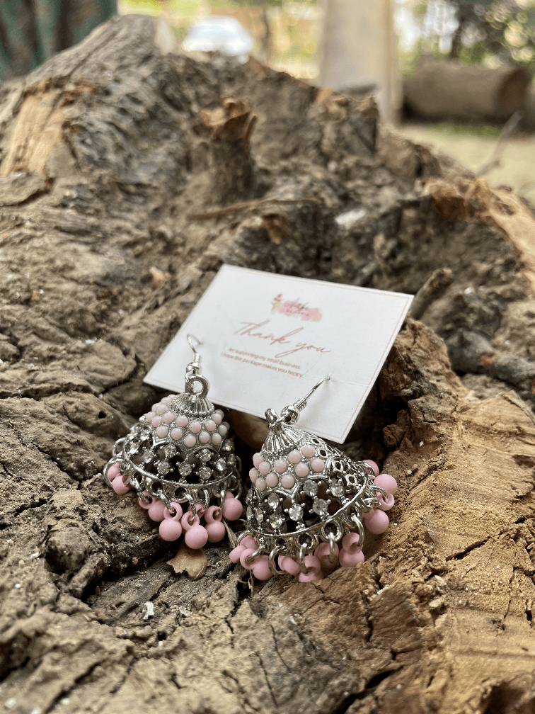 Trendy earrings: Pink Pearl Jhumkis at AmbsbyMaria